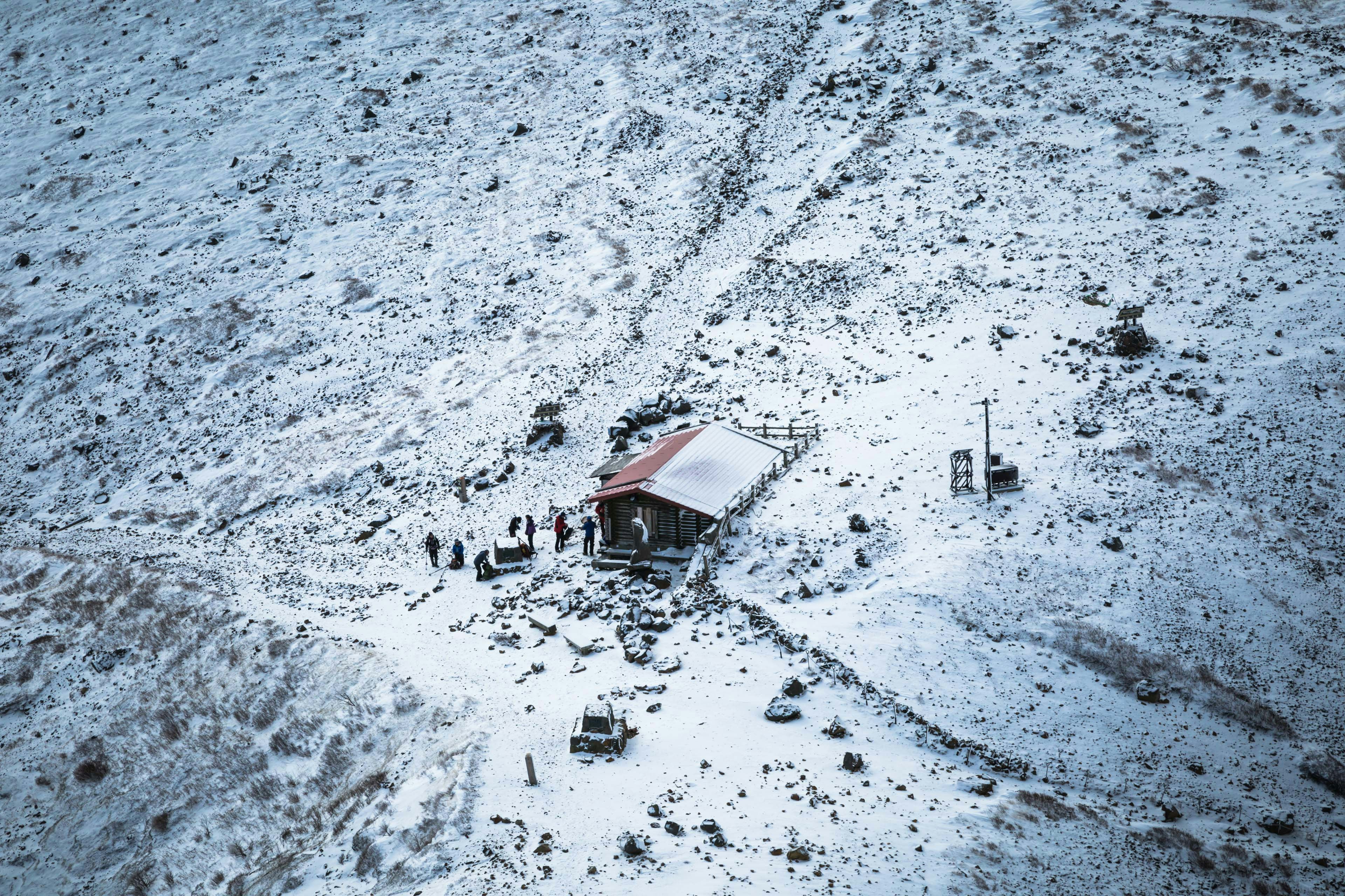 brown house on snow field